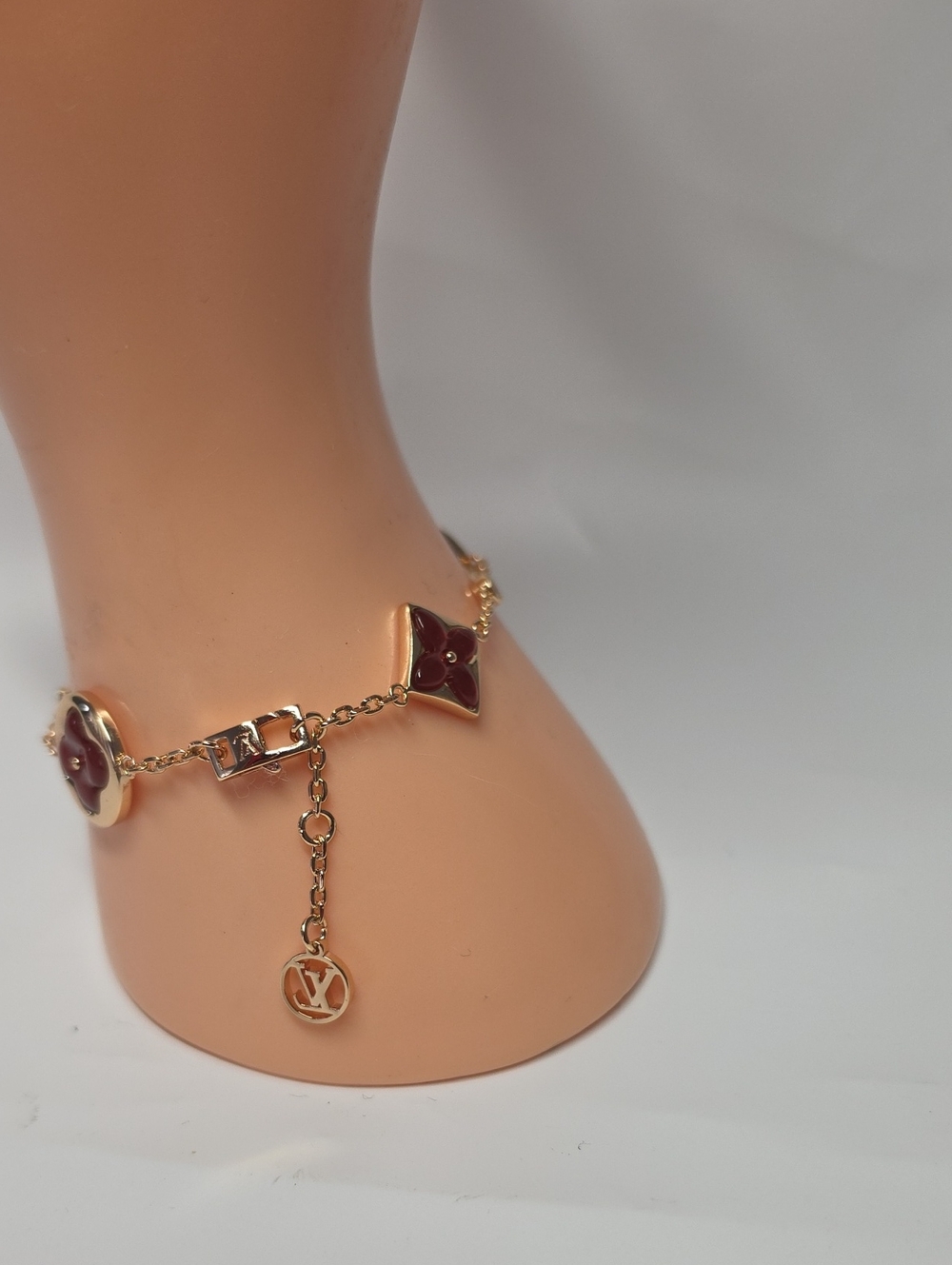 Gold Chain Bracelet with Burgundy Enamel Motifs